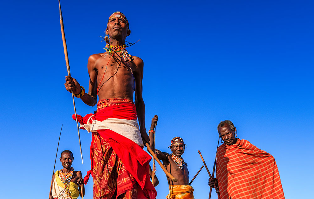 Kenyan Massai dancing their tradition songs